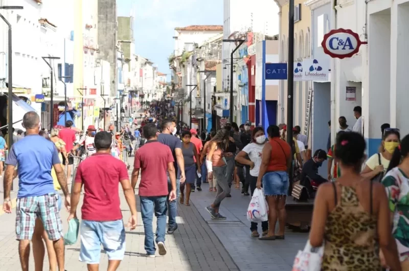 Funcionamento do comércio da Grande Ilha no dia de Corpus Christi.